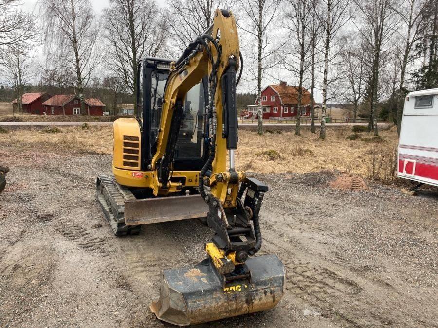 Caterpillar 302.7D avec accessoire + Remorque vue 6