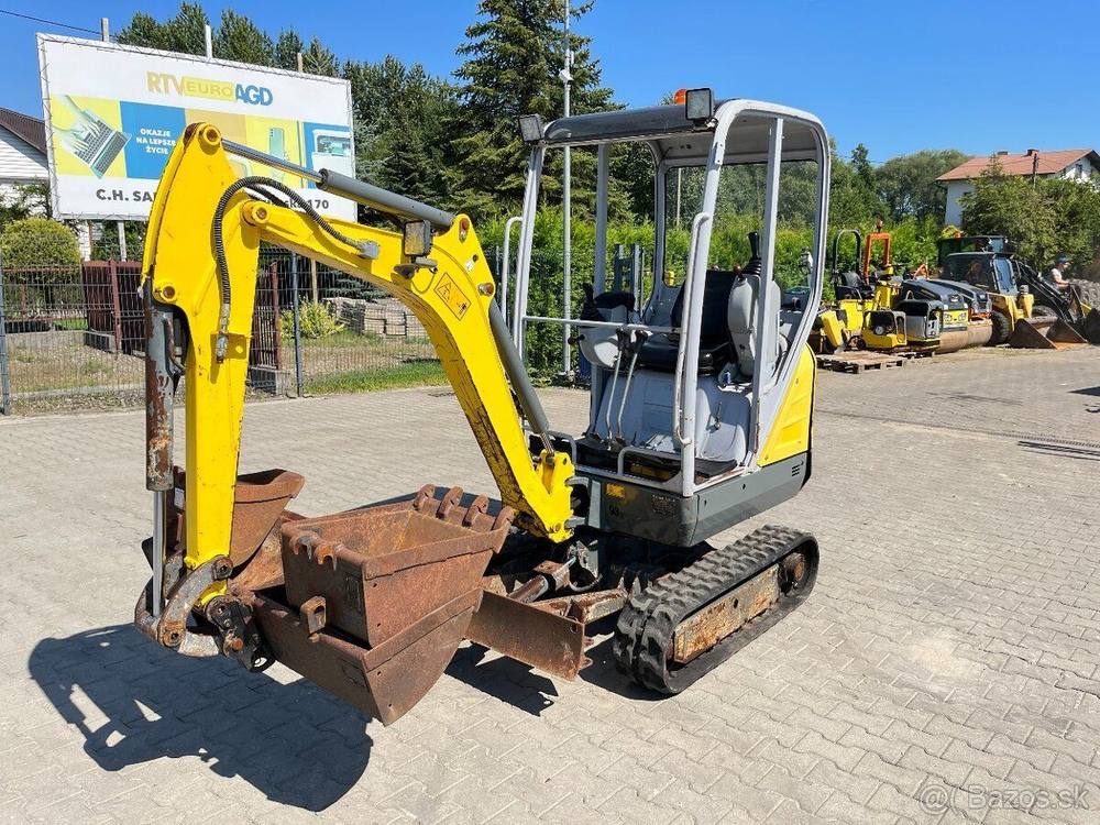 Wacker Neuson 1404 avec 3 godets