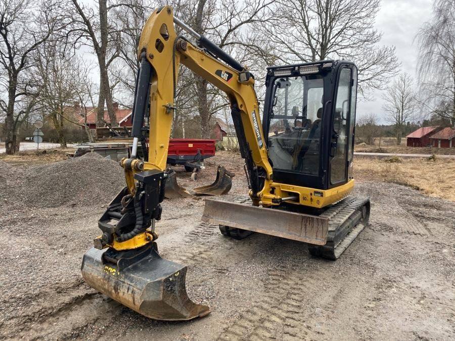 Caterpillar 302.7D avec accessoire + Remorque vue 5