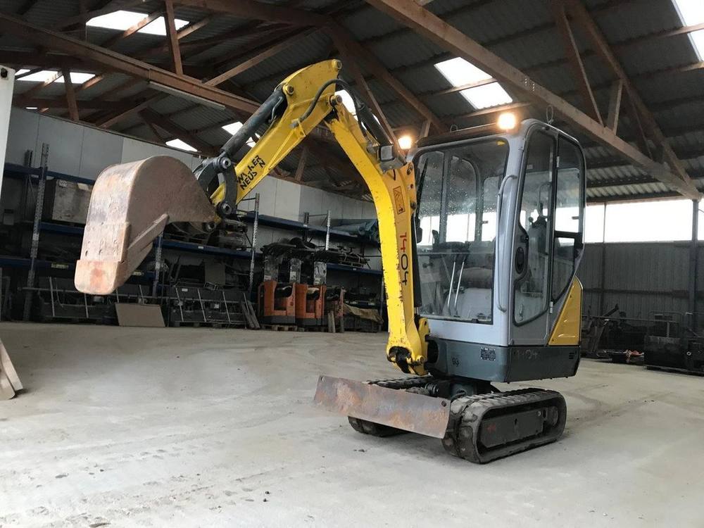 Wacker Neuson 1404 avec 3 godets