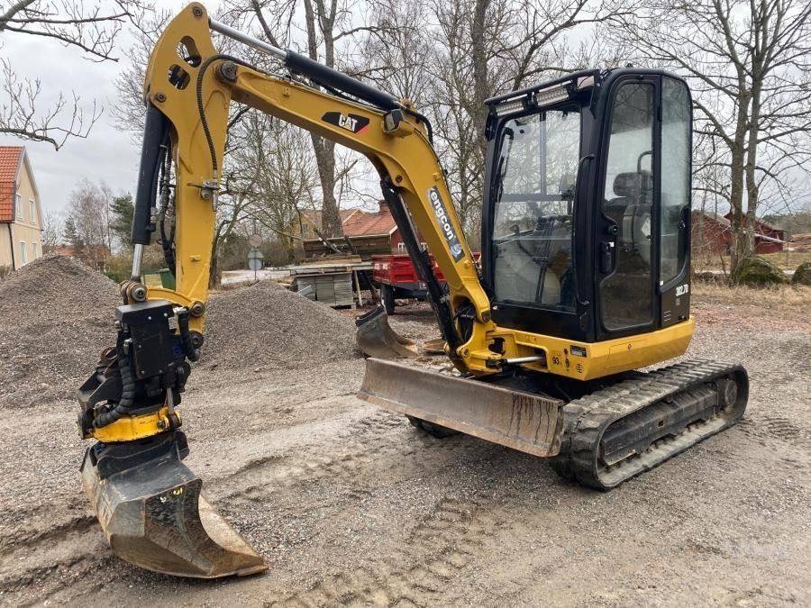 Caterpillar 302.7D avec accessoire + Remorque vue 4